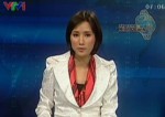 BTV Lê Bình trong chương trình Bản tin Tài chính - Kinh doanh sáng 6/4/2011 trên VTV1. (Ảnh chụp lại từ màn hình)